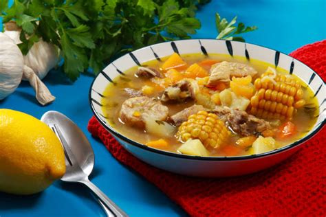  Sancocho de Gallina: Savory Broth Simmered with Tender Chicken and Vibrant Vegetables for an Explosion of Flavors!